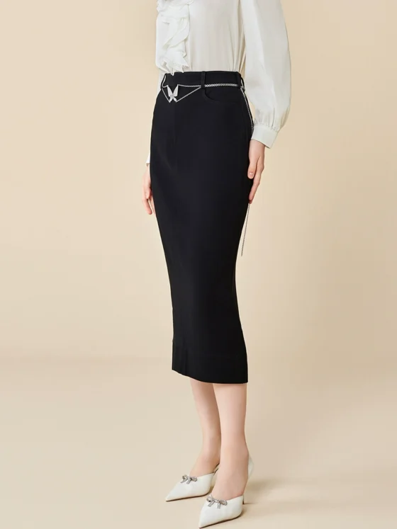 a new black acetate A-line skirt with a rear slit