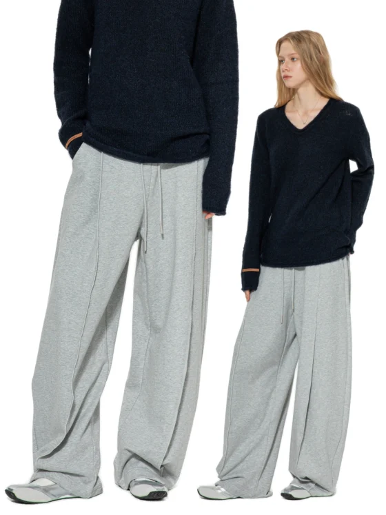 A woman in flower-gray casual sweatpants