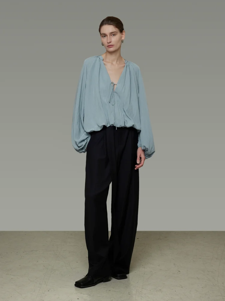 A large V-neck tie shirt