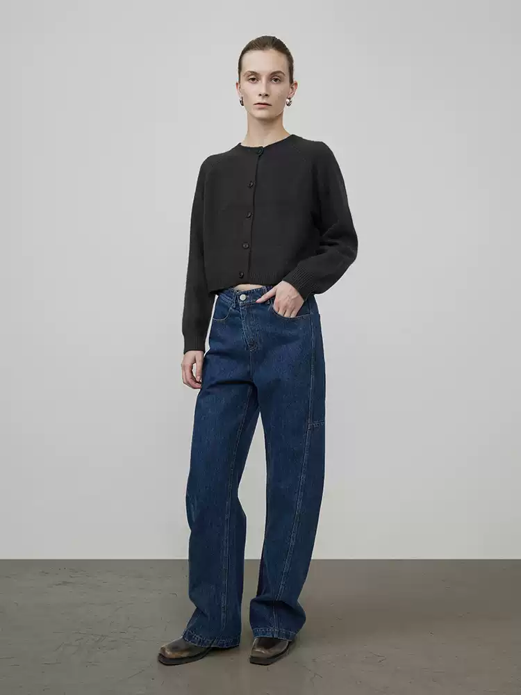 A curved knife deconstructs a woman in jeans