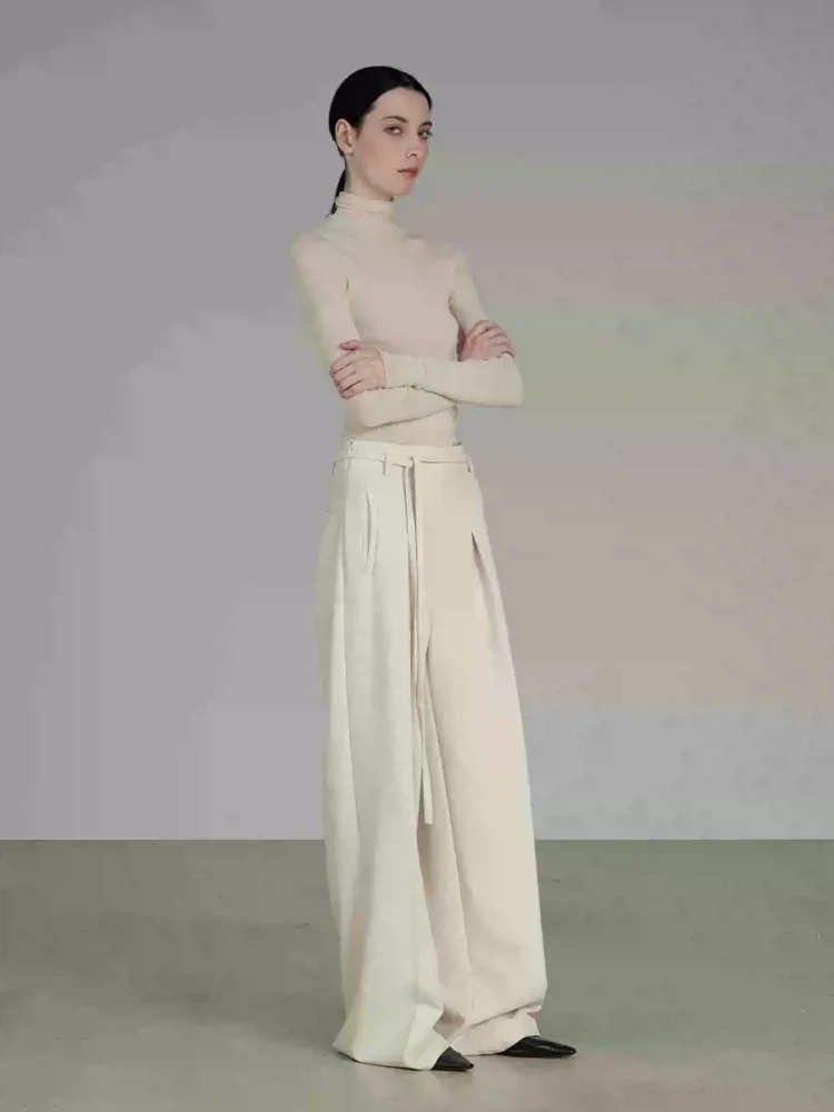 The waistband design gives a sense of drape and texture