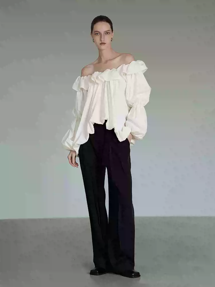 Floor-length pants with a high-end drape