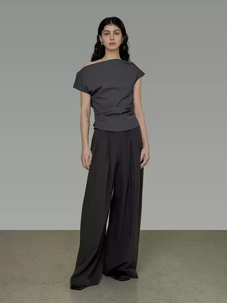 Women wearing lace-up pleated wide-leg pants
