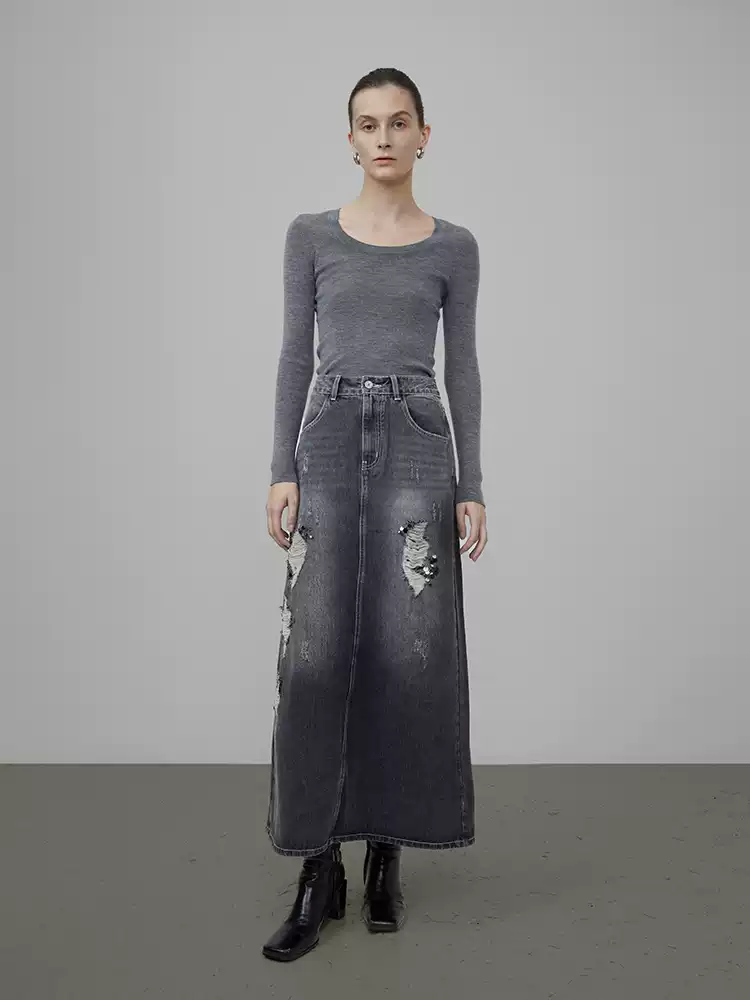 A vintage washed-out denim skirt