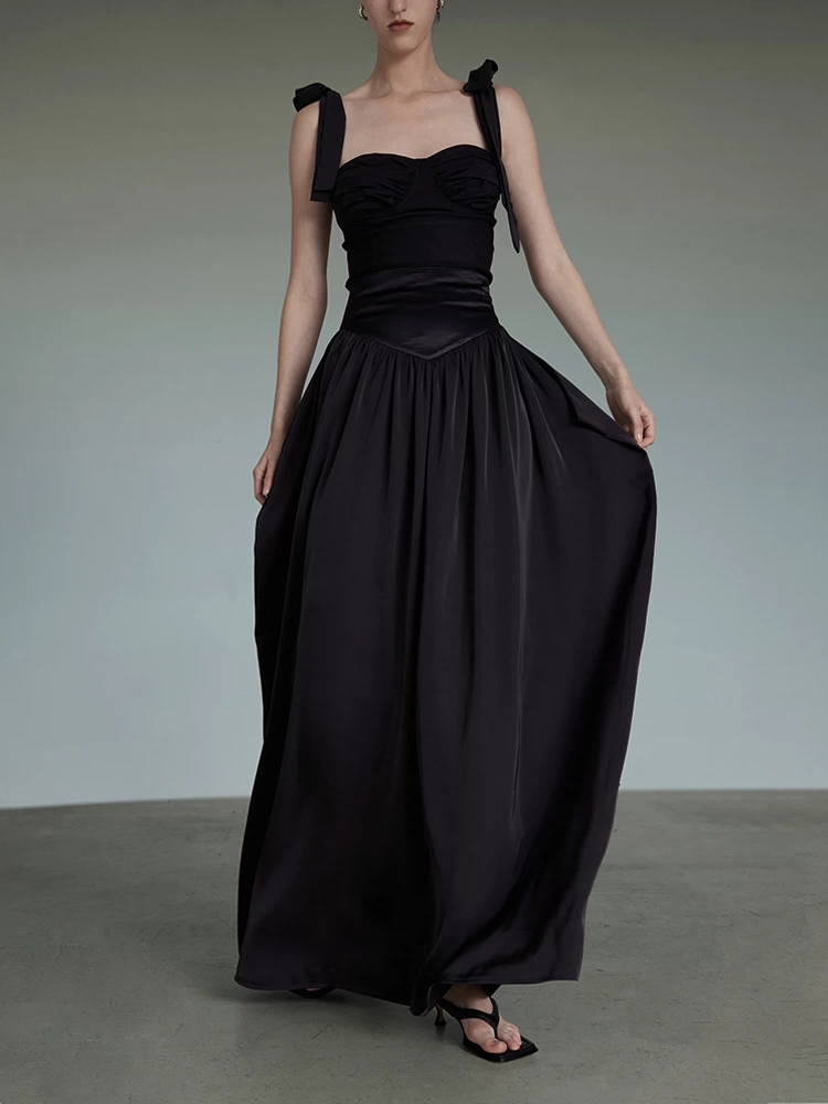 A high-end black floor-length dress with a touch of elegance