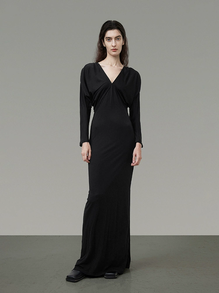 A black long dress that slimmers and conceals flesh