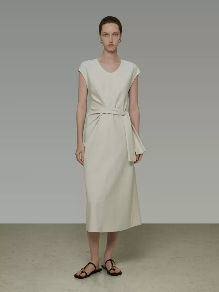 Loose, straight, asymmetrical lace-up long skirt