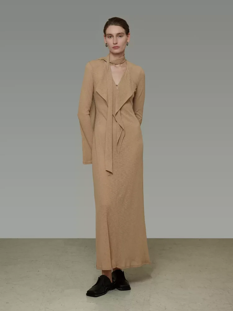 A stylish V-neck dress with flowing ribbons