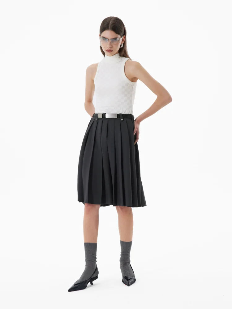 A grey mid-waisted suit dress with loose edges