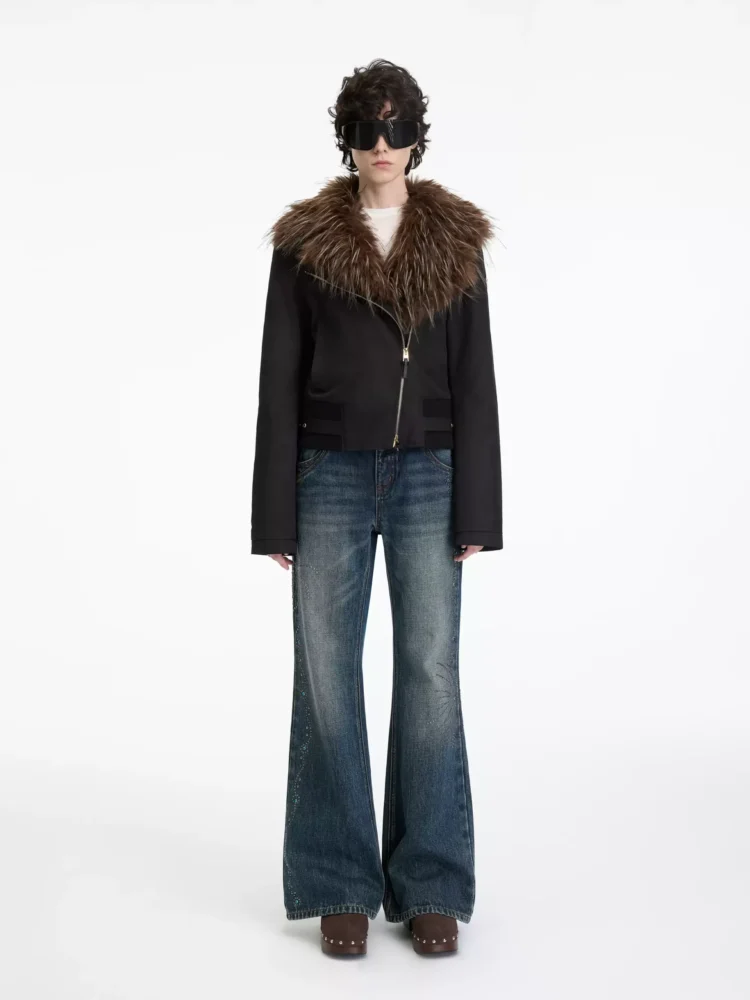 Women's mid-waisted, slightly flared jeans with rivets