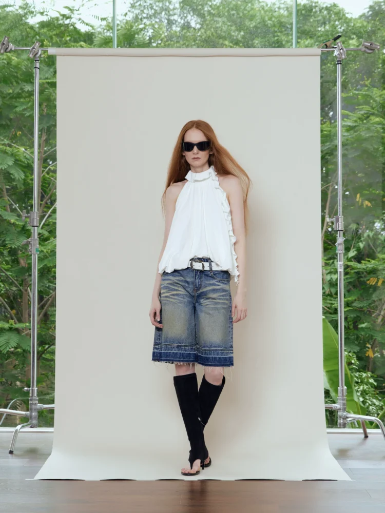 Distressed seven-inch loose denim midpants