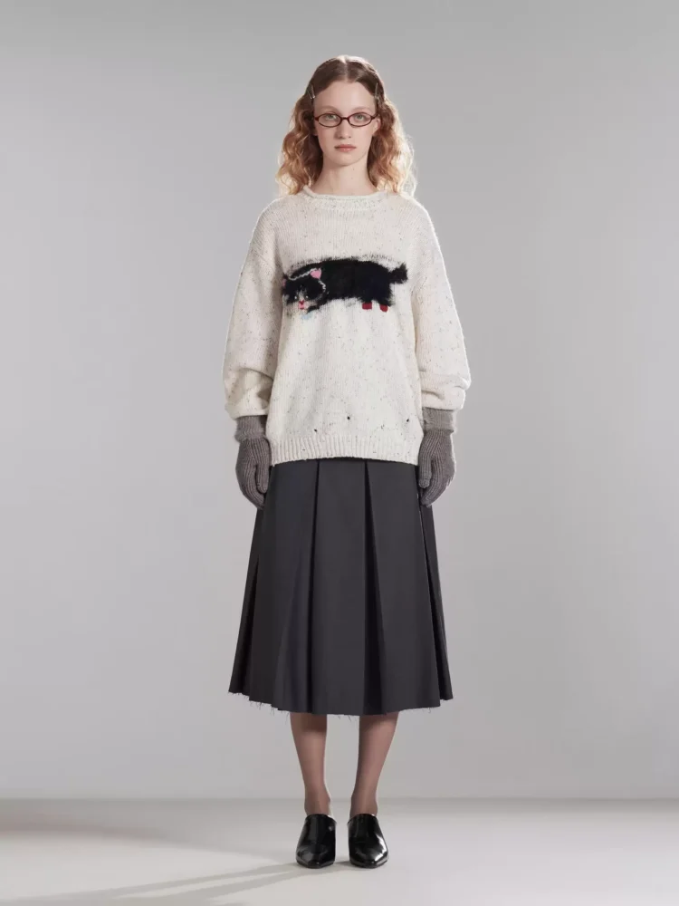 A laid-back cat sweater girl