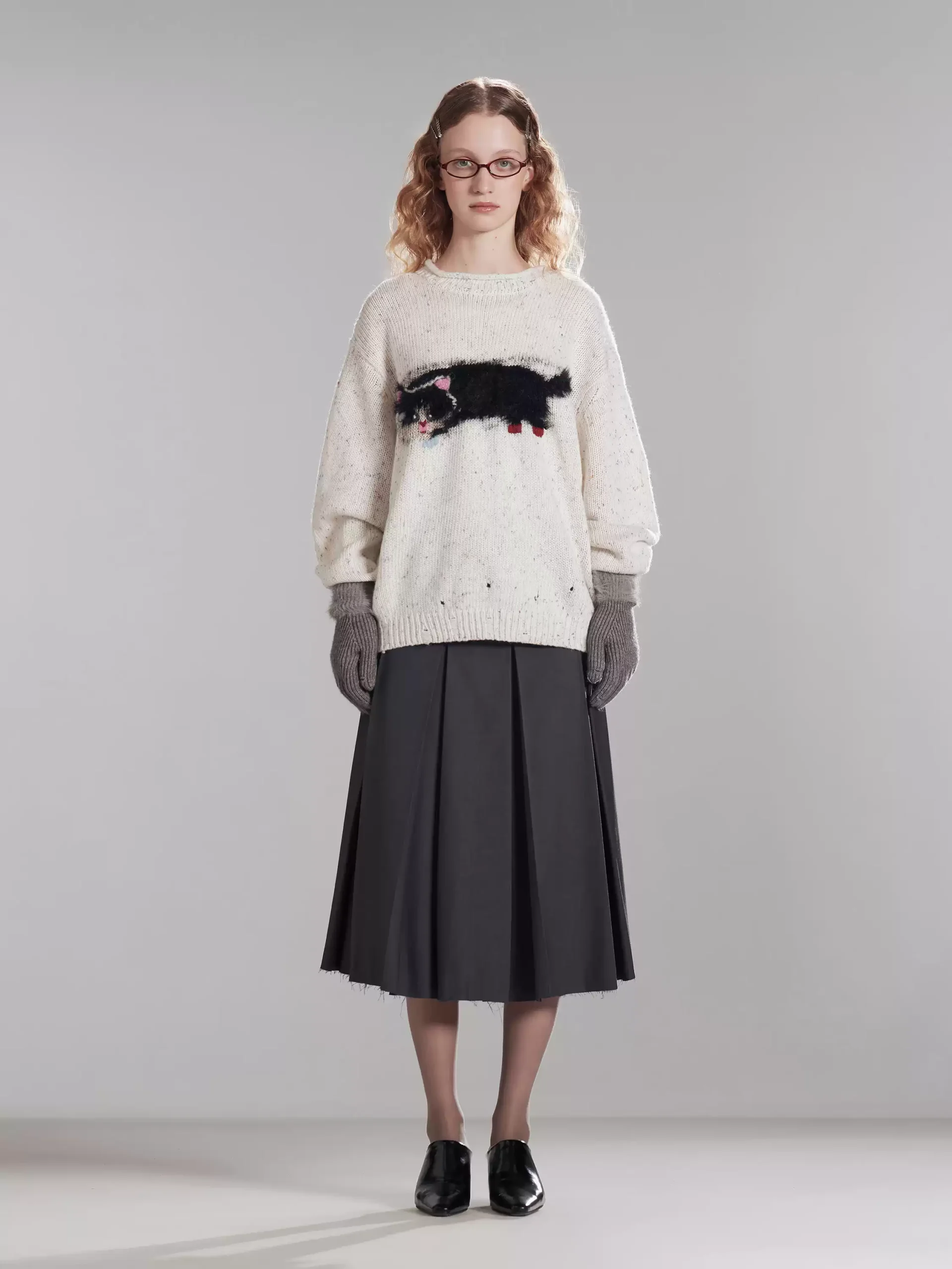 A laid-back cat sweater girl