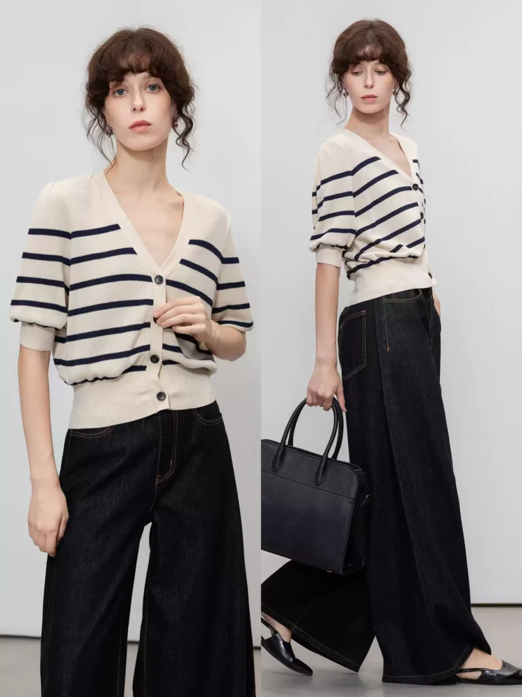 A woman with a striped V-neck cardigan