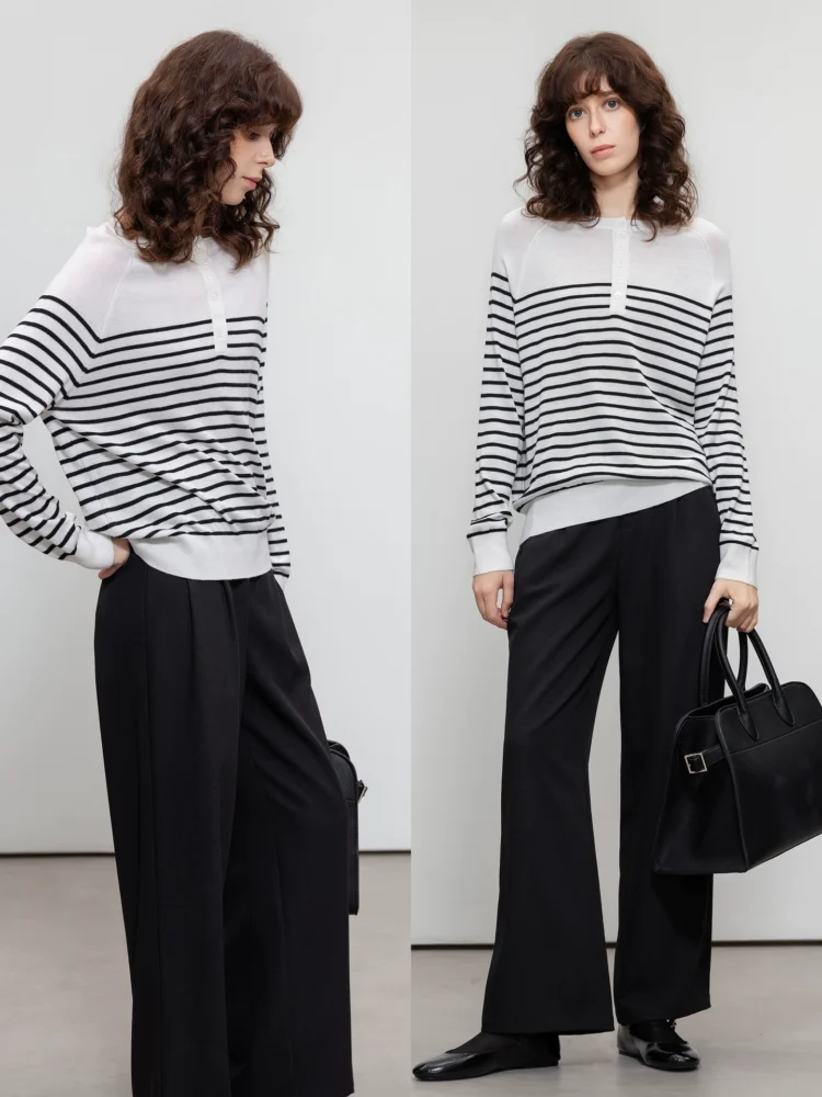 A woman in a striped sweater with an artistic style