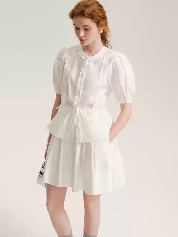 A lady's white short-sleeved shirt
